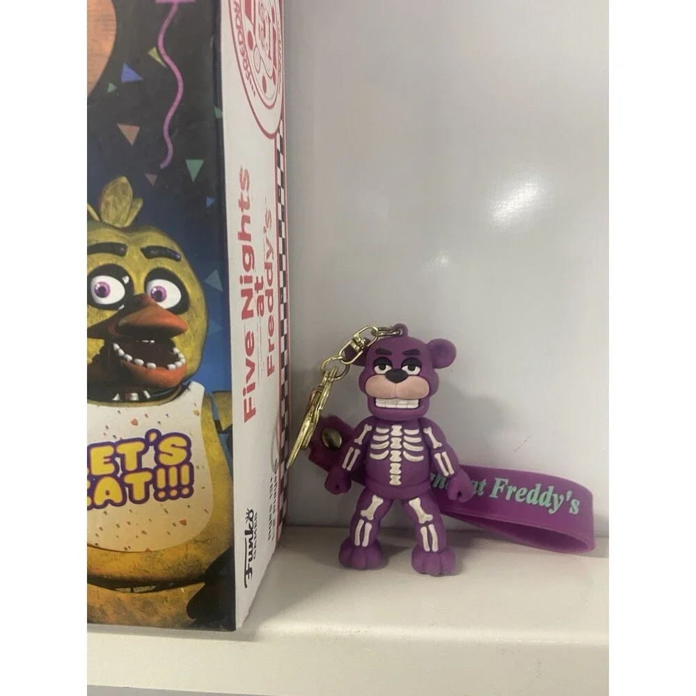 Five Nights At Freddy’s Survive Til 6 AM Game Plus Keychain Figure Combo